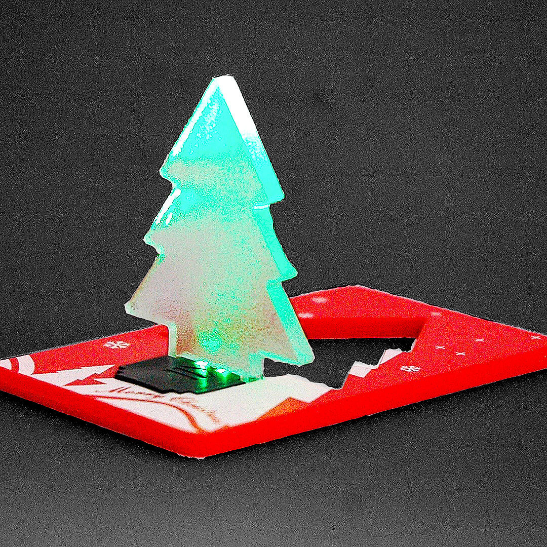 LED-Karten-Leuchte-Weihnachten-Werbeartikel Flatlite in Tannenbaumform mit Ihrer Werbung beducken.