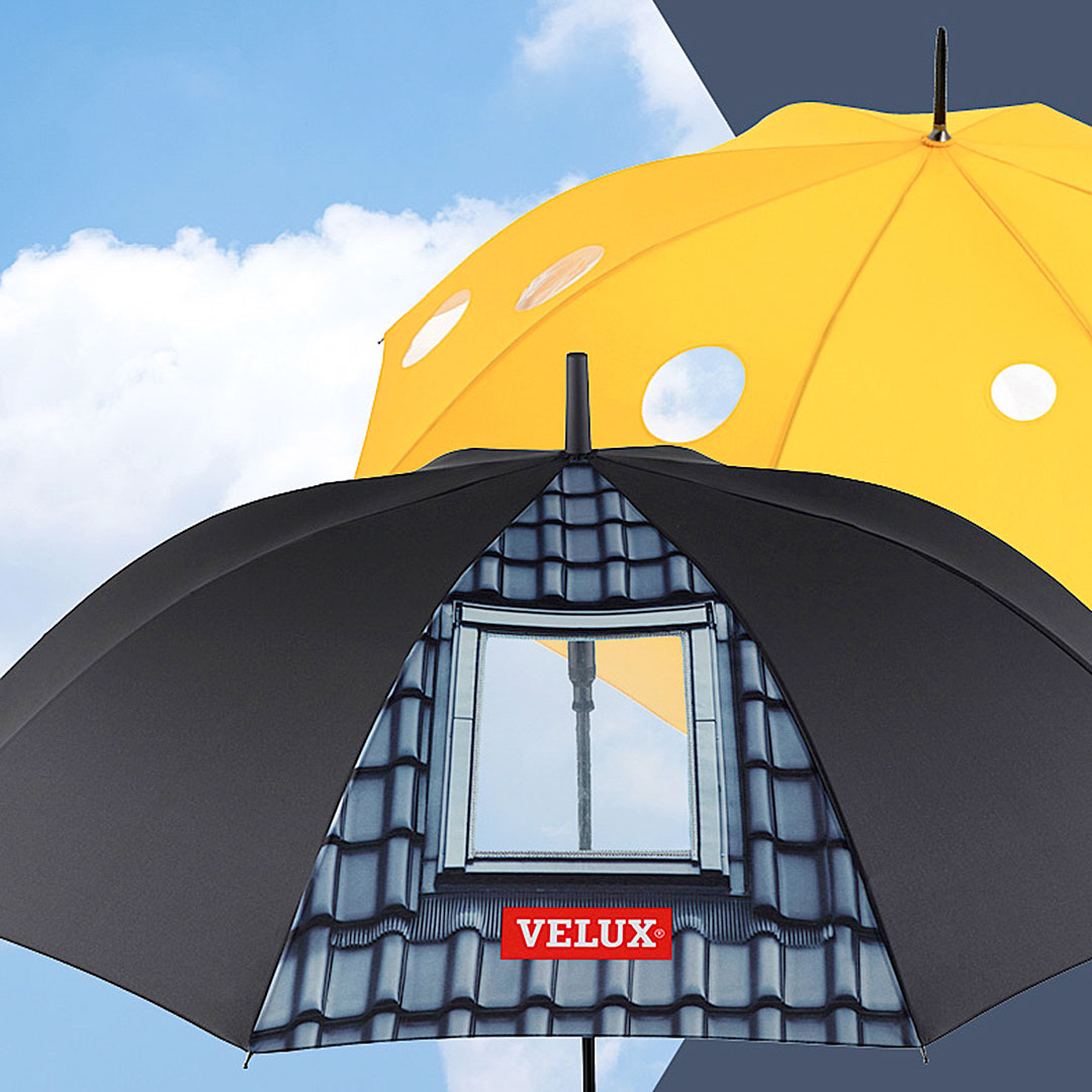 Velux Regenschirm mit eingebautem Sichtfenster. Als Werbeartikel mit Logo zu bedrucken.